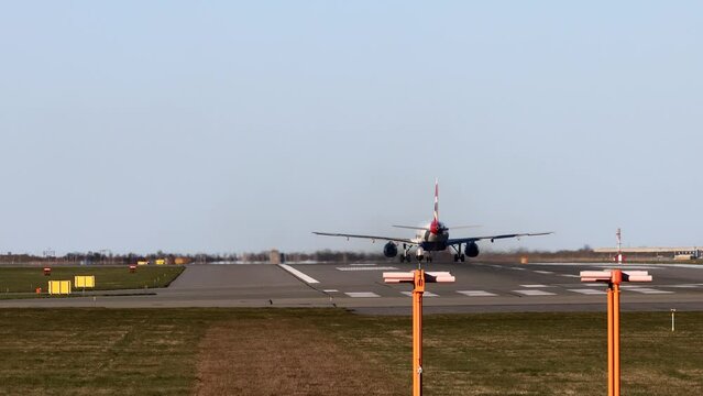 Copenhagen, Denmark A jet passenger airplane on the runway at Kastrup airport lifts off.