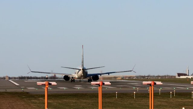 Copenhagen, Denmark A jet passenger airplane on the runway at Kastrup airport lifts off.