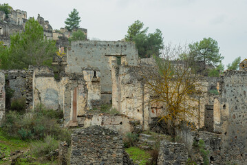 Abandoned Greek village in Turkey. Stone houses and ruins of Fethiye Kayakoy.