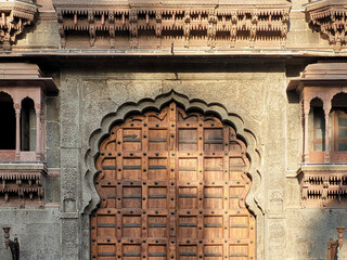 Carved Arches & Windows of fort wall of Rajwada, Indore, Madhya Pradesh. Also known as the Holkar...