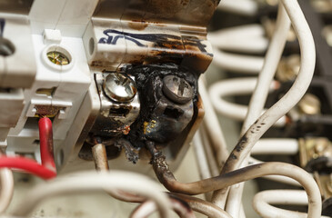 Burnt contacts of electric switchgear equipment.
