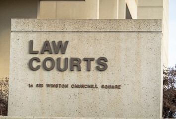 Edmonton, Alberta, Canada. Mar 30, 2023. Law Courts sign outside of the building downtown Edmonton