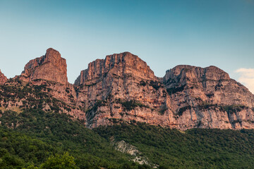 Fototapeta premium Rock walls of Vikos Gorge seen from Papingo Mikro traditional greek mountain village, Greece
