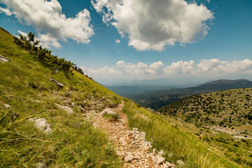 Fototapeta premium Mountain path in Vikos National Park near Tymfi's mountain refuge in Pindus Mountain, Greece