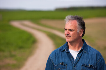 Mature man outdoors in spring.