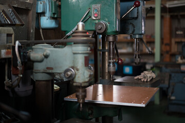 Part machining with drilling machine