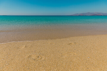 Beautiful empty beach Agios Prokopios on Naxos Island with turquoise sea lagoon