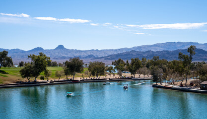 Fototapeta na wymiar Bridgewater Channel at Lake Havasu City, Arizona. The channel canal was dredged under London Bridge and flooded, which creates a shortcut between Thompson Bay and the rest of Lake Havasu to the north.