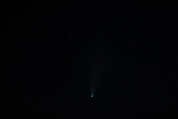 Obraz na płótnie Canvas Night photography of comet Newise over greek island Santorini