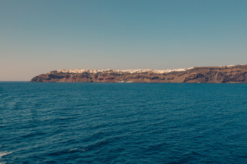 Santorini, Grece - July 23, 2020 - White houses of Imerovigli on the top of Santorini caldera