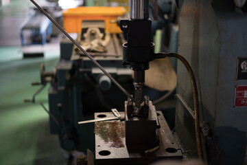 Work of bending the cut material with a press machine
