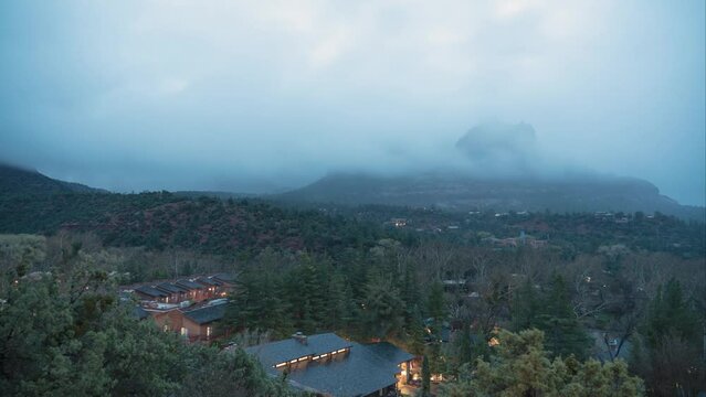 Timelapse of clouds moving over the Snoopy Rock in Sedona, AZ.