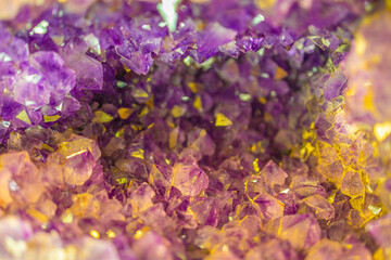 Fototapeta na wymiar Bright Violet and gold Texture from Natural Amethyst
