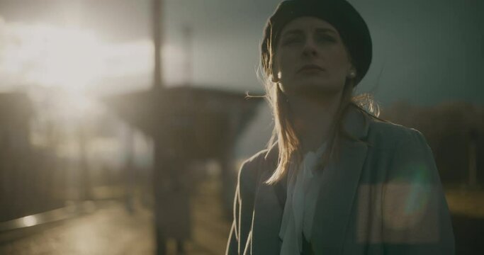 Pensive Thoughtful Woman At Railway Station