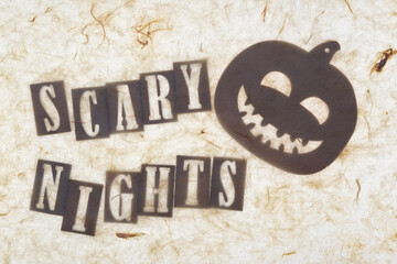 halloween them with text: "scary nights" and a jack o lantern with a big smile