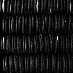 Rows of chocolate sandwich cookies