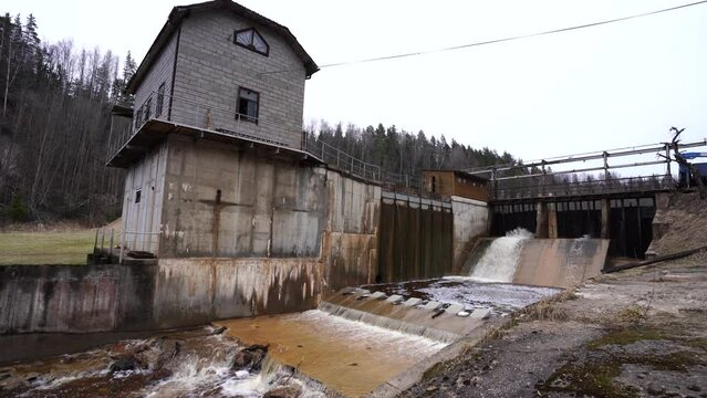 A small hydroelectric power station is located on the river in spring