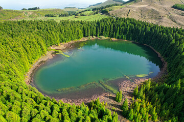 The Lagoa do Canario lake is related to the volcanic formation of the Sete Cidades crater and is surrounded by typical Macaronesian forests and Cryptomeria plantations