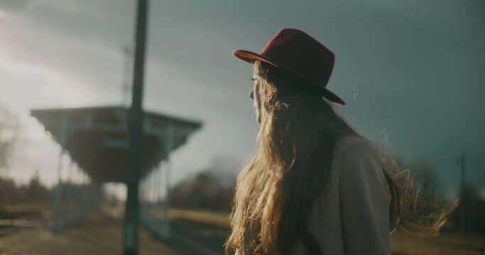 Pensive Thoughtful Woman At Railway Station