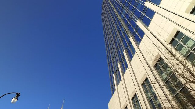 Point Of View Tilt Up Modern Buildings In City Against Clear Sky On Sunny Day - Nashville, Tennessee