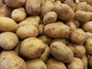 Potatoes on the counter of a vegetable store, close-up