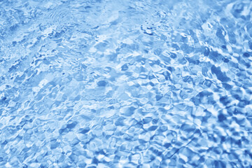 texture of transparent clear water in the pool blue abstract background