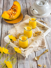 puding labu, pumpkin pudding in glass bottles on a tray