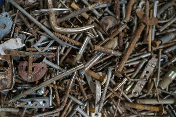 Detail of different metallic bolts and nuts