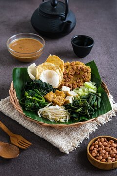 pecal is boiled mixed vegetables with peanut sauce