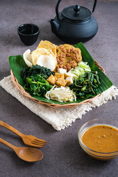 pecal is boiled mixed vegetables with peanut sauce