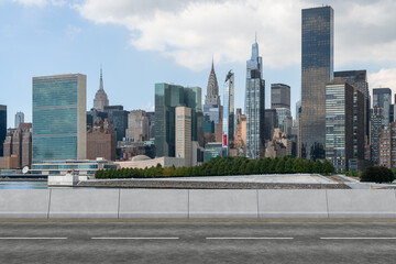 Empty urban asphalt road exterior with city buildings background. New modern highway concrete construction. Concept of way to success. Transportation logistic industry fast delivery. New York. USA.