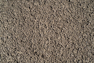 Brown ground texture, soil surface. Abstract background.