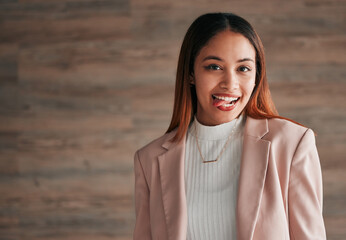 Happy, portrait and woman with her tongue out by a wall with a positive, goofy and confident mindset. Happiness, excited and headshot of a young female model fro Mexico with a silly face expression. - obrazy, fototapety, plakaty