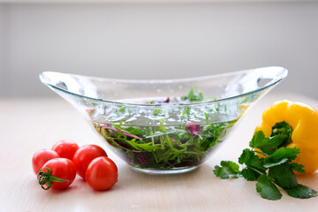Super Slow Motion Shot of Flying Cuts of Colorful Vegetables and Water Drops fresh vegetables and water splash on white background. High quality photo