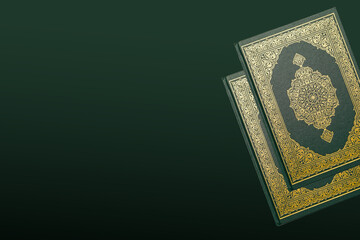 The Holy Al Quran with written arabic calligraphy meaning of Al Quran and rosary beads or tasbih on dark green black background with copy space.