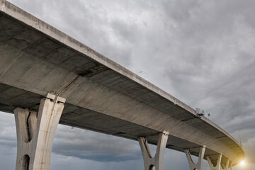 Fototapeta na wymiar Expressway tollway bridge for transport and sunlight in morning travel concept.