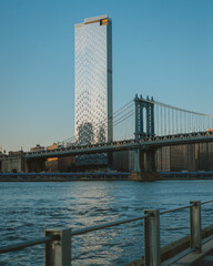 View of out-of-place tall building and the Manhattan Bridge across the East River, Brooklyn, New York