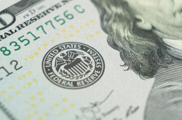 Macro shot image of the corner of a 100 dollar bill banknotes. Concept of financial success....