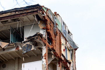 dismantled old building. Half demolished house, dismantling of the old one for the construction of...