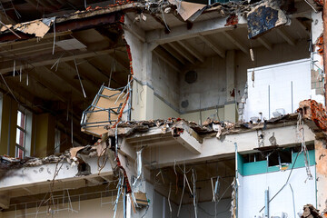 dismantled old building. Half demolished house, dismantling of the old one for the construction of...