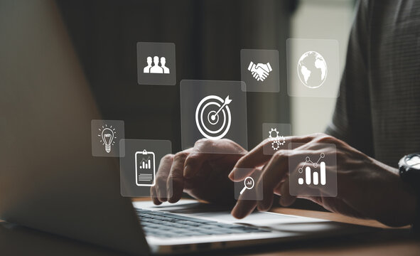 Entrepreneur type on keyboard for set business target with big data analytic for online marketing campaign that can increase sale revenue, reach to online marketplace customer. SEO concept