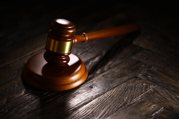Judges gavel on wooden desk. Law firm concept.