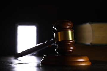 Judges gavel on wooden desk. Law firm concept.