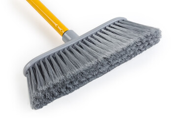 Brush of sweeping broom close-up on white background