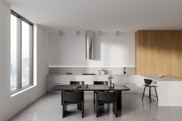 Light home kitchen interior with cooking and eating zone, panoramic window
