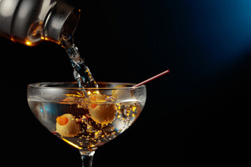 Martini with green olives.