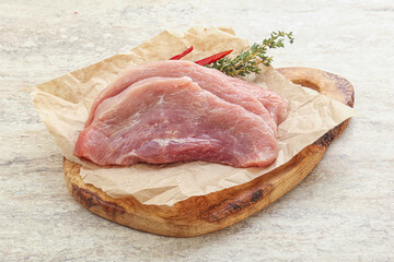 Raw pork schnitzel for roast
