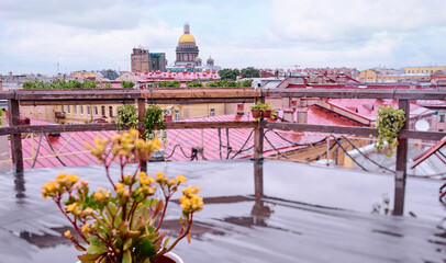Cafe terrace on the roof top with beautiful view of Saint Peterburg old town.