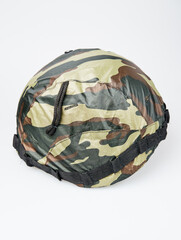 Fototapeta premium Camouflage, green, khaki military helmet, isolated white background