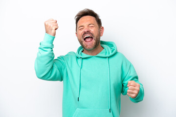 Naklejka premium Middle age caucasian man isolated on white background celebrating a victory